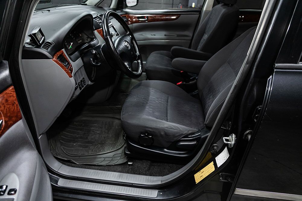 Close-up of custom Toyota seat covers in a family SUV with two-tone stitching